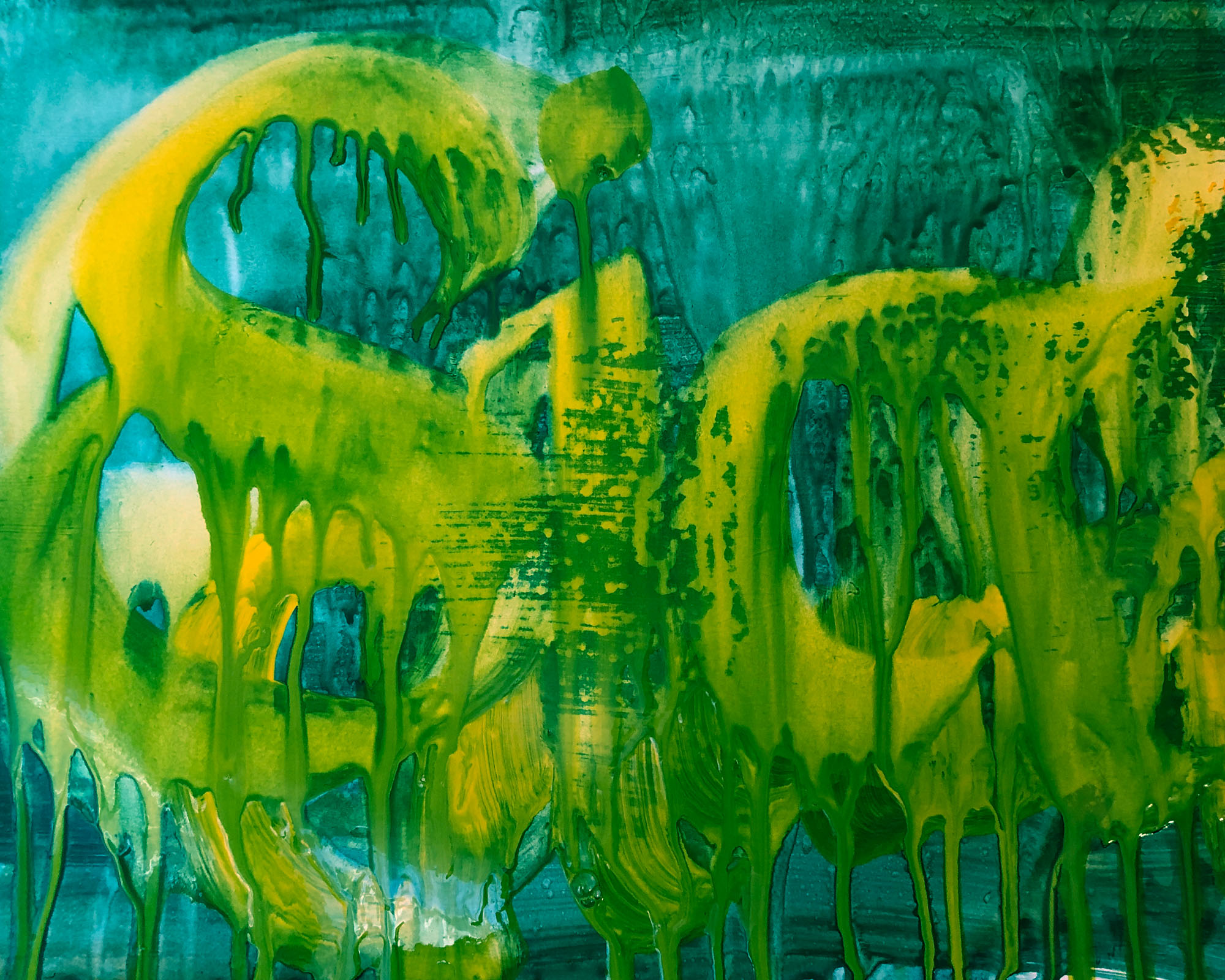 Sia written in yellow on a muddy green partially dry under layer
